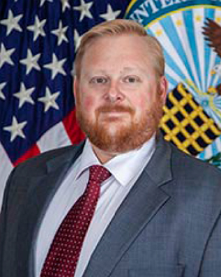 Official photograph of Adam Fleshman